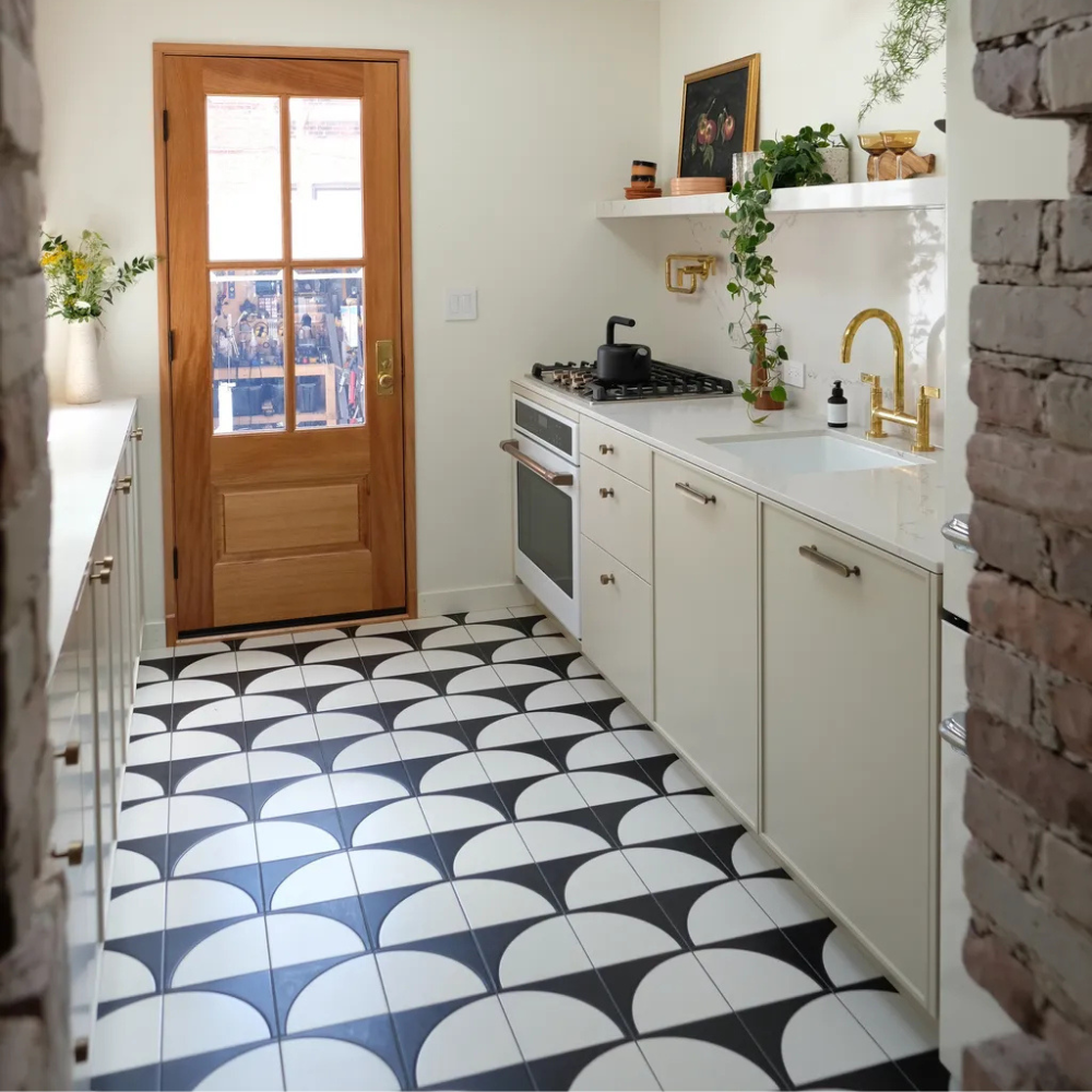 Kitchen after tile replacement flooring with clean grout lines and finished look in Upstate South Carolina